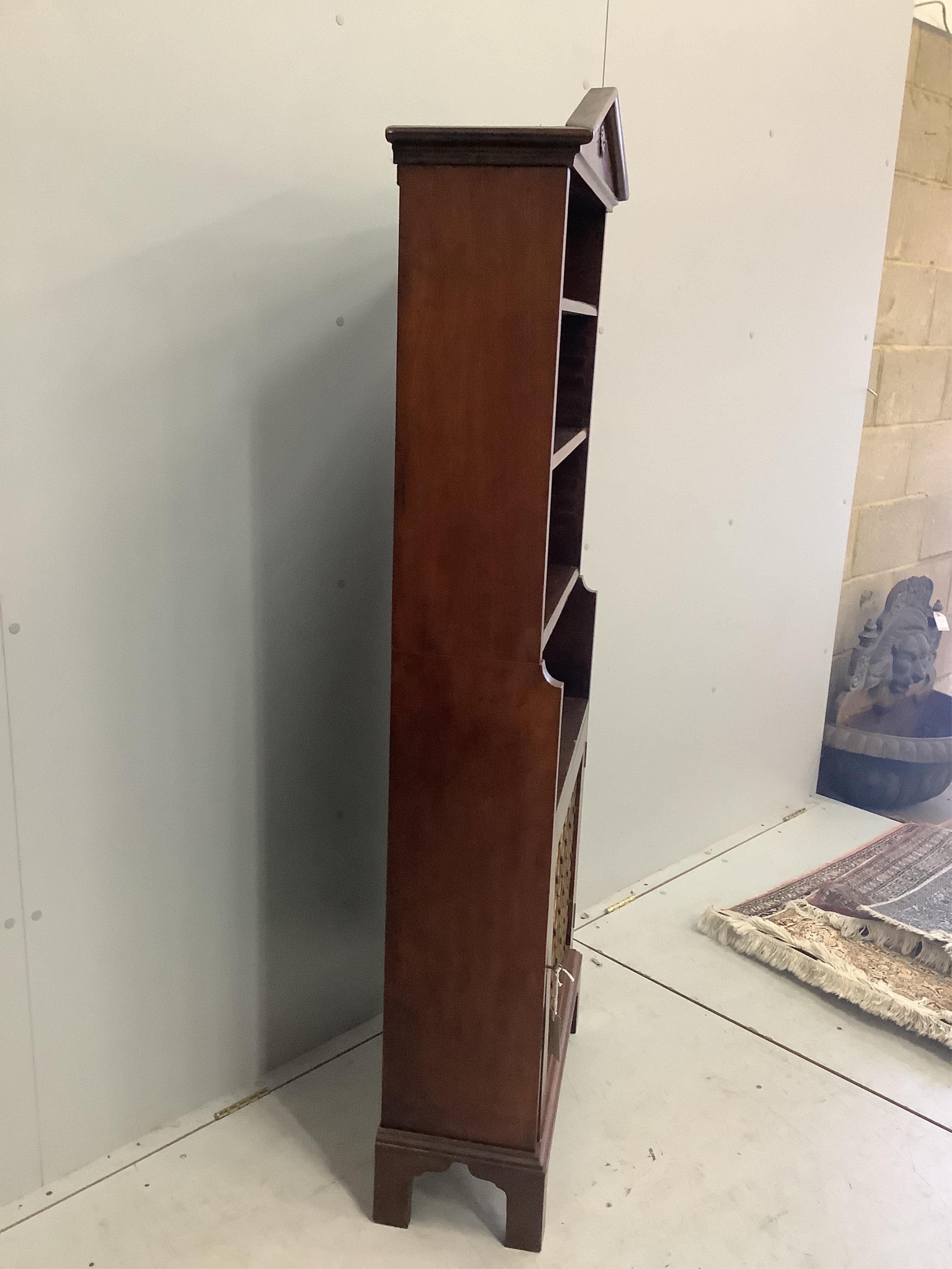 A Regency style mahogany open bookcase, width 60cm, depth 26cm, height 166cm. Condition - fair